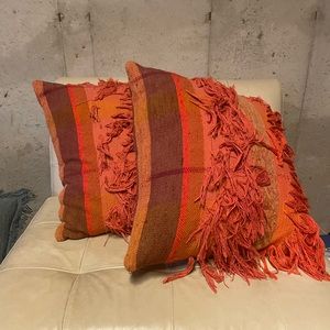 Assortment of pillows and curtains